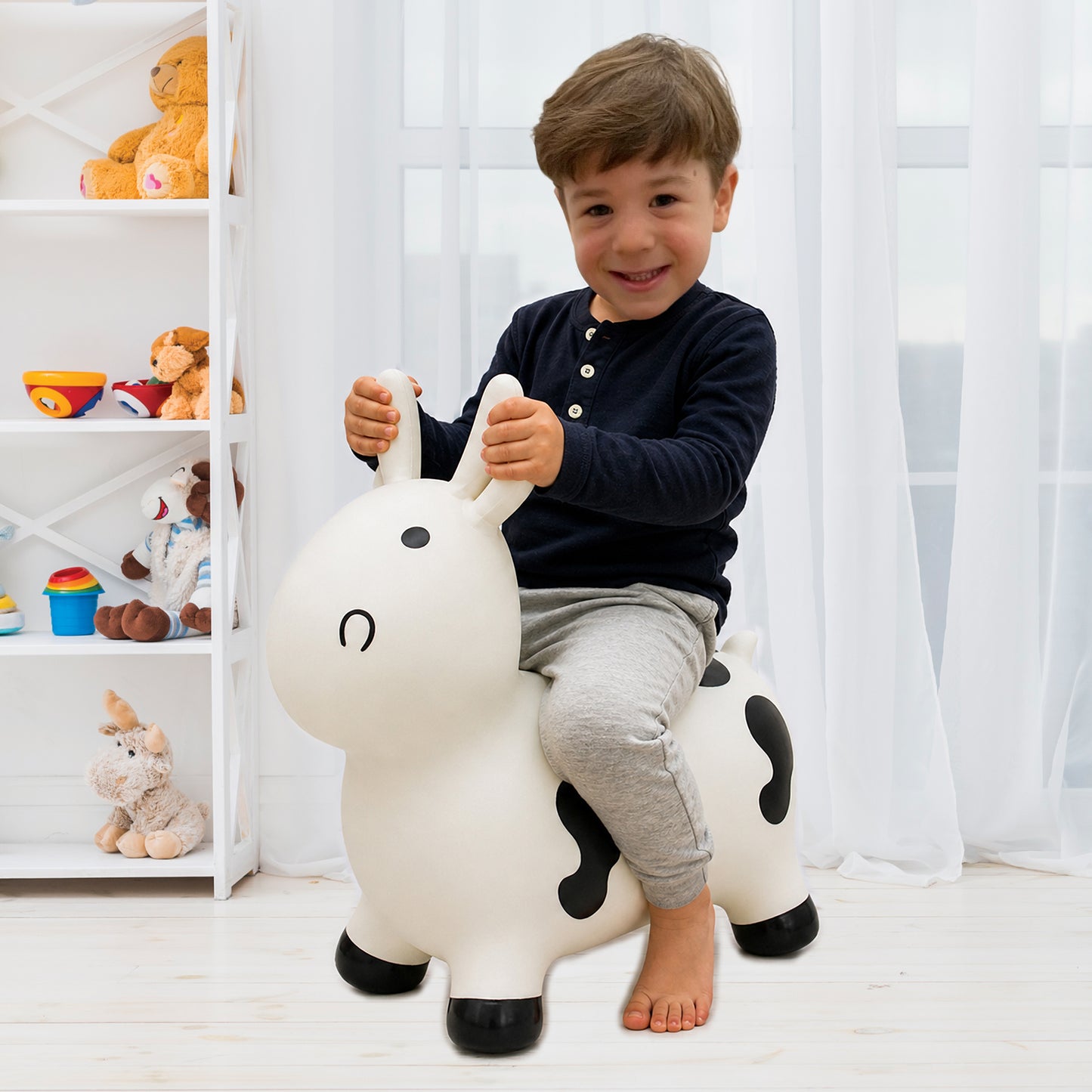 BounceZiez Inflatable Bouncy Ride-On Hopper with Pump - Cow